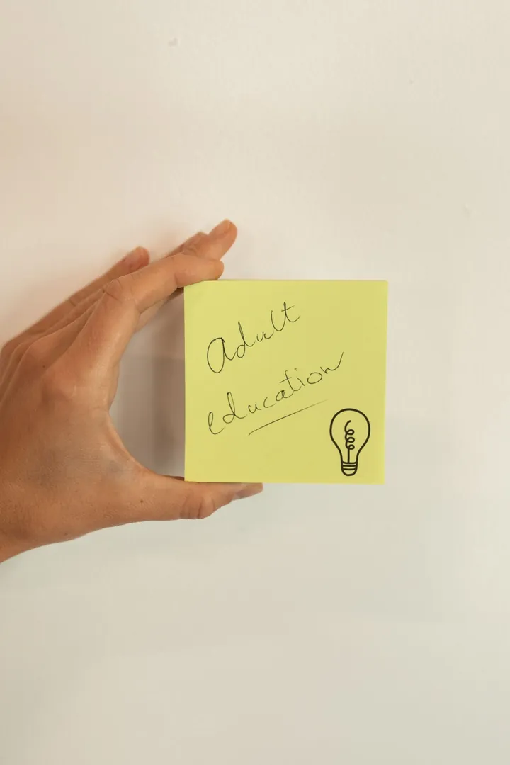 Handwritten sticky note before changing text in the image: “Adult” → “early”